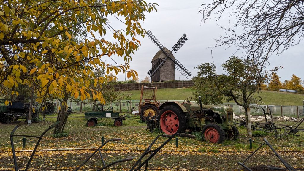 Windmill and tractor